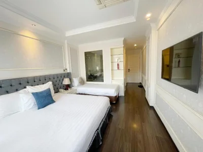 Camera Tripla Deluxe — Luxury Old Quarter Hotel & Gym